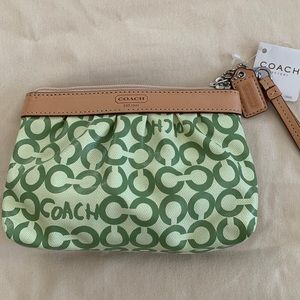 Lime green leather coach wristlet